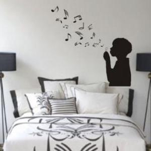 Boy Blowing Music Notes Wall Mural Decal Sticker..