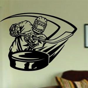 Ice Hockey Player Shooting Puck Vinyl Wall Decal..